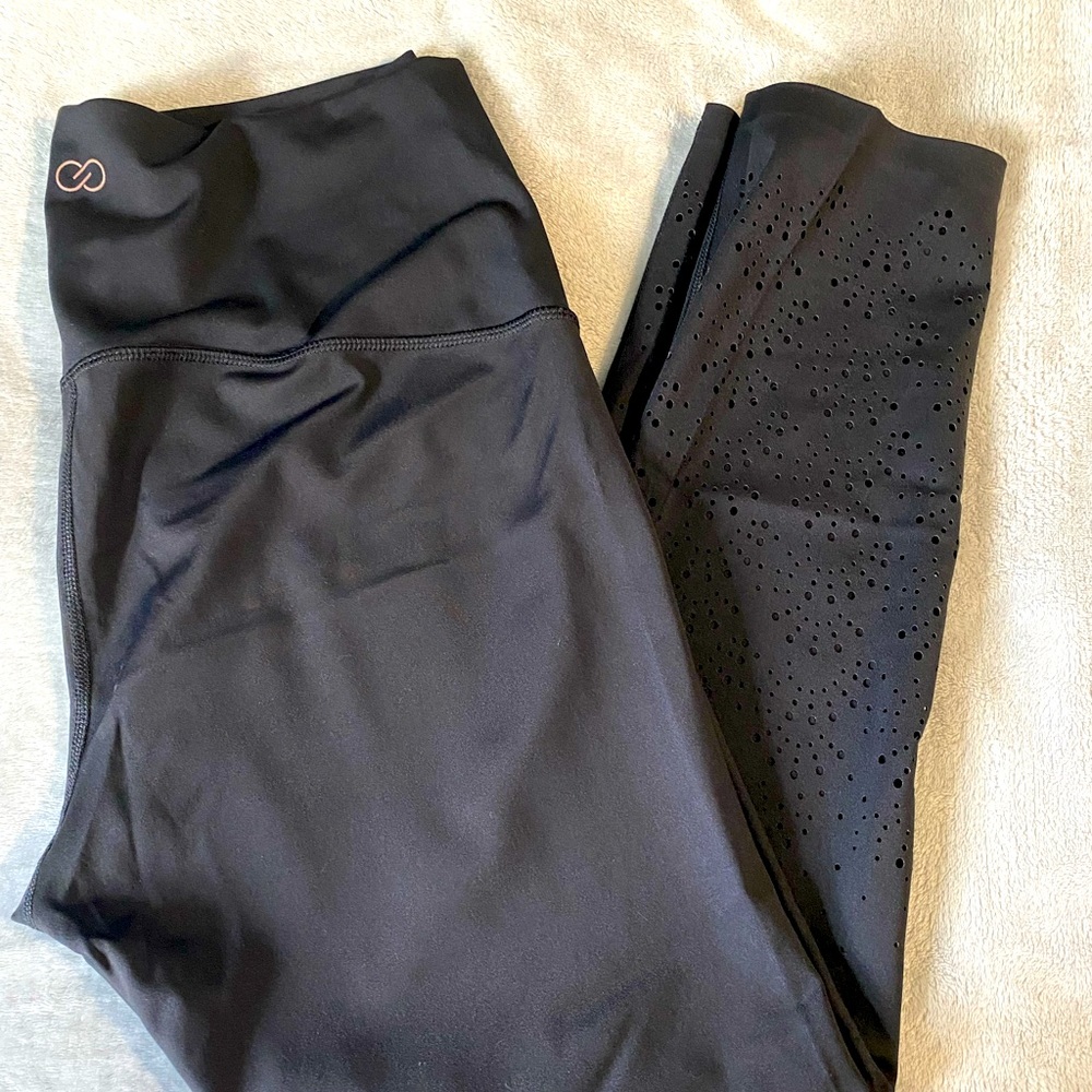 Calia by Carrie Underwood. Black size XL with detail on bottom of leg